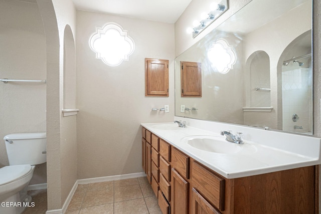 3340 Tierra Yvette Ln, El Paso, TX 79938 - full bath with double vanity, tile patterned flooring, and a shower