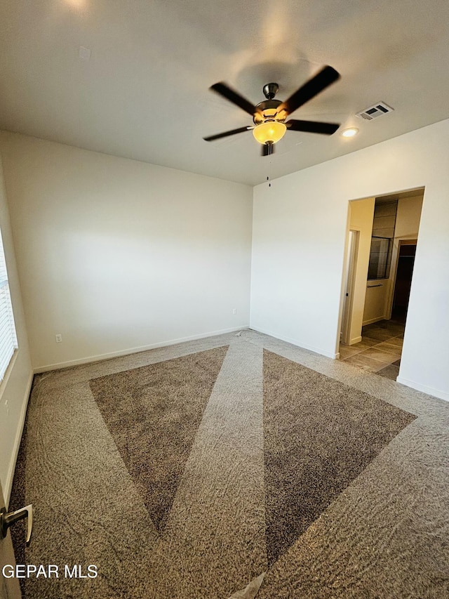 13066 Emerald Isle St, El Paso, TX 79928 - carpeted spare room featuring a ceiling fan and baseboards