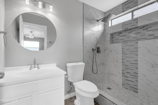 6913 Jericho Tree Dr, El Paso, TX 79934 - full bathroom featuring a marble finish shower, ceiling fan, and plenty of natural light