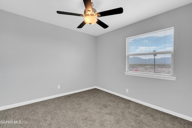 6913 Jericho Tree Dr, El Paso, TX 79934 - carpeted spare room with baseboards and a ceiling fan
