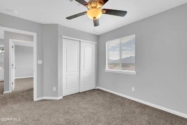 6913 Jericho Tree Dr, El Paso, TX 79934 - unfurnished bedroom featuring carpet floors, a closet, and ceiling fan