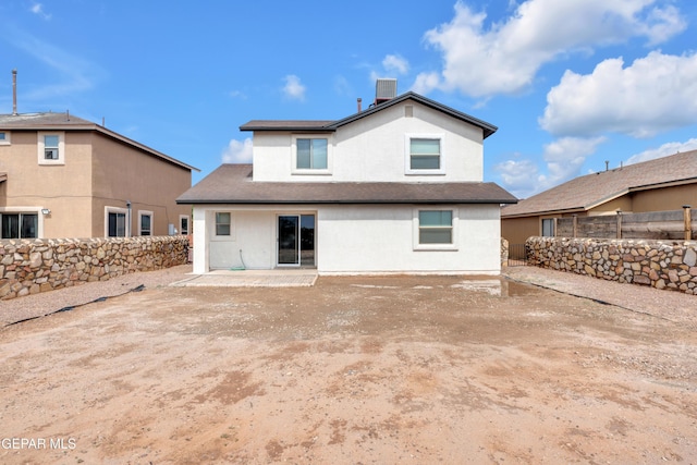 6913 Jericho Tree Dr, El Paso, TX 79934 - back of house featuring a patio area and roof with shingles