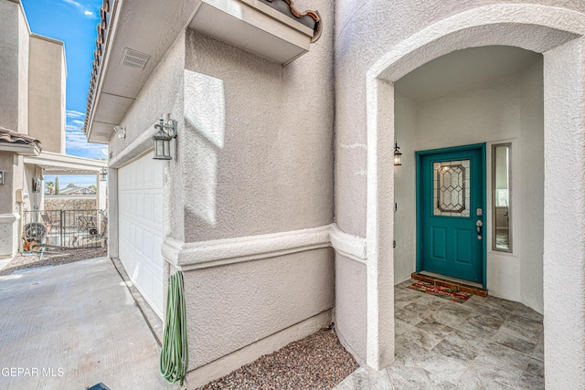 12257 Gaudi Way, El Paso, TX 79938 - property entrance featuring stucco siding