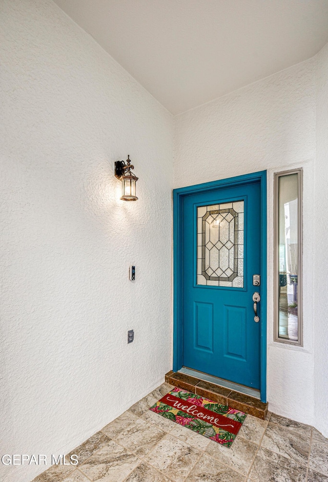 12257 Gaudi Way, El Paso, TX 79938 - doorway to property featuring stucco siding