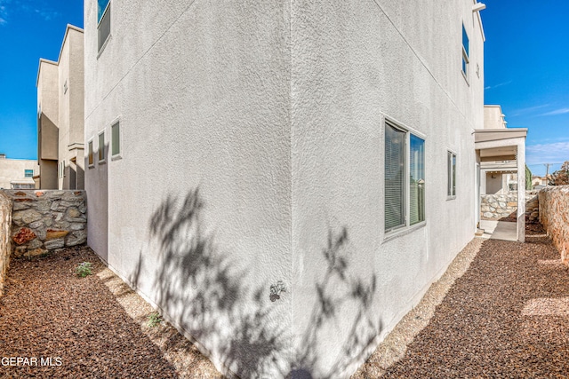12257 Gaudi Way, El Paso, TX 79938 - view of side of home featuring stucco siding