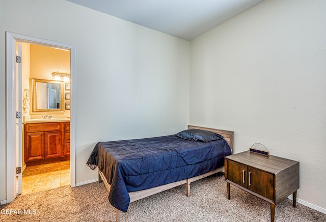 12257 Gaudi Way, El Paso, TX 79938 - bedroom with light carpet and ensuite bath