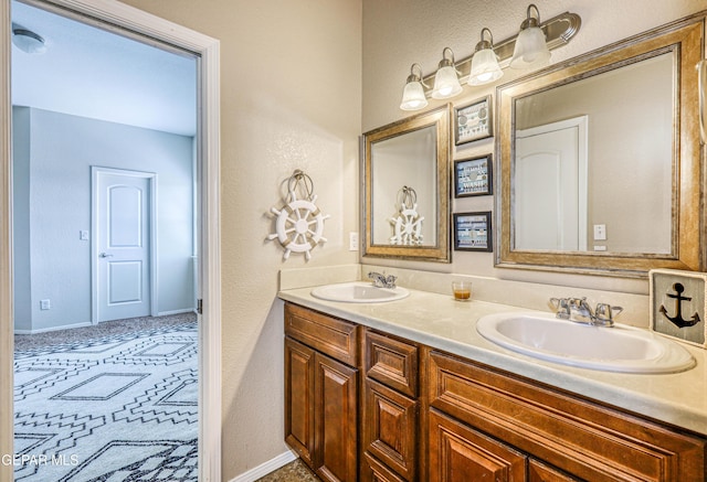 12257 Gaudi Way, El Paso, TX 79938 - full bath featuring a textured wall and double vanity