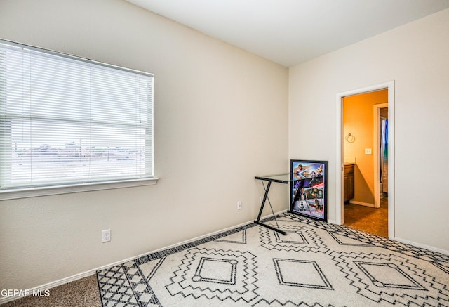 12257 Gaudi Way, El Paso, TX 79938 - unfurnished bedroom featuring baseboards and carpet