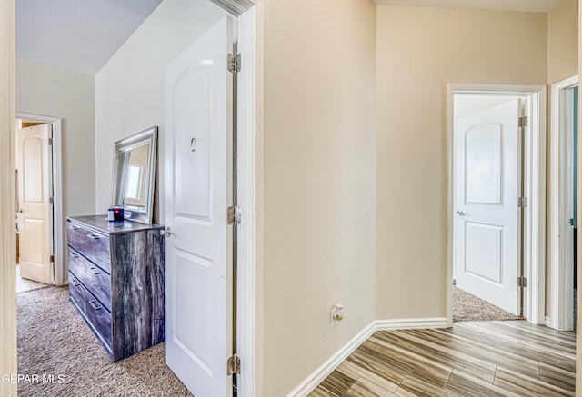 12257 Gaudi Way, El Paso, TX 79938 - hall featuring baseboards and light wood-style floors