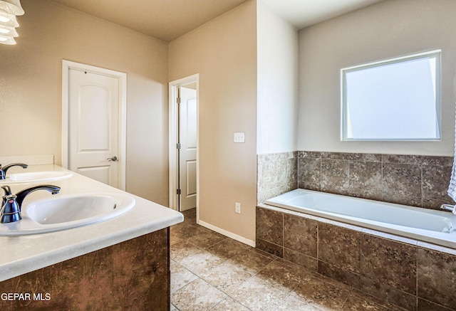 12257 Gaudi Way, El Paso, TX 79938 - bathroom with a garden tub and double vanity