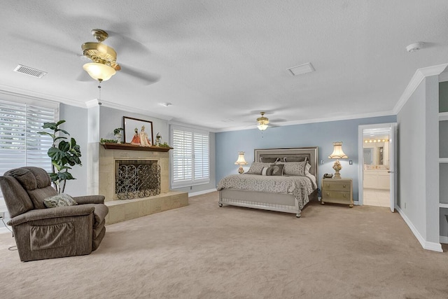 5315 Montoya Dr, El Paso, TX 79932 - carpeted bedroom featuring ornamental molding, a premium fireplace, a textured ceiling, and a ceiling fan