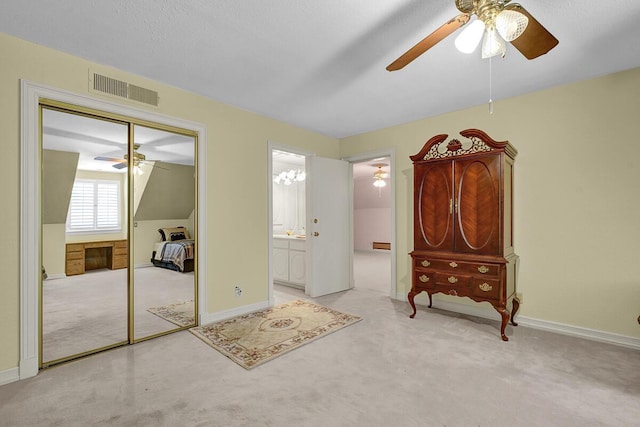 5315 Montoya Dr, El Paso, TX 79932 - carpeted bedroom with a closet, ensuite bathroom, and ceiling fan