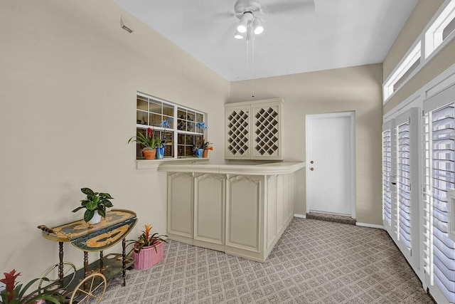 5315 Montoya Dr, El Paso, TX 79932 - kitchen with light colored carpet and a ceiling fan