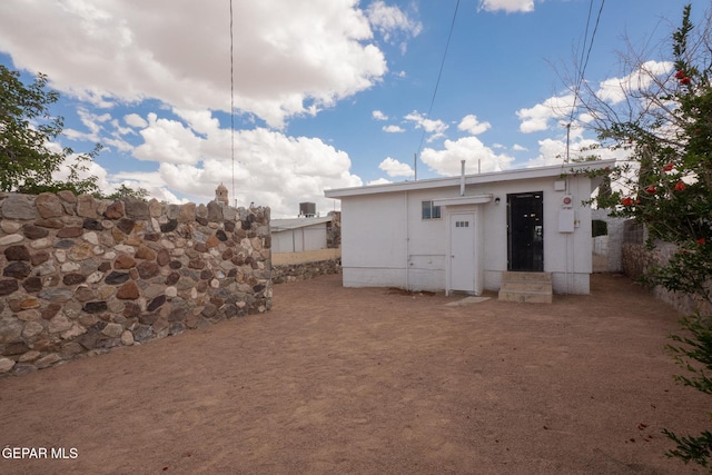 3411 Memphis Ave, El Paso, TX 79930 - rear view of house with entry steps
