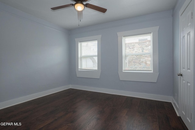 3411 Memphis Ave, El Paso, TX 79930 - spare room featuring healthy amount of natural light, dark wood-style floors, and ceiling fan