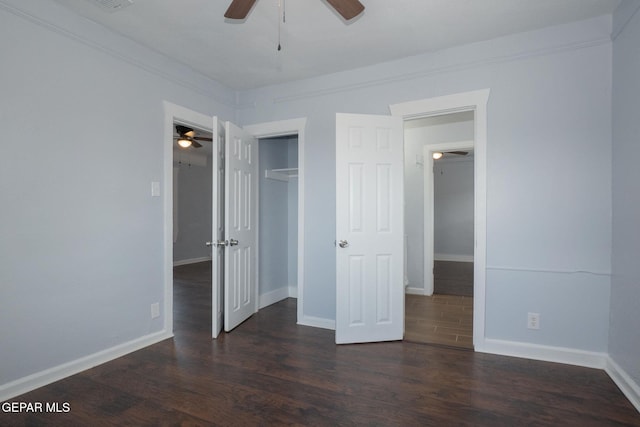 3411 Memphis Ave, El Paso, TX 79930 - unfurnished bedroom featuring dark wood-style floors, a closet, and ceiling fan