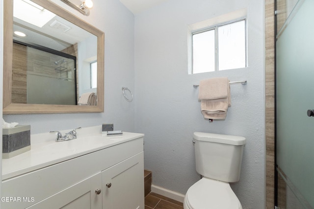3411 Memphis Ave, El Paso, TX 79930 - bathroom with vanity and a shower with shower door