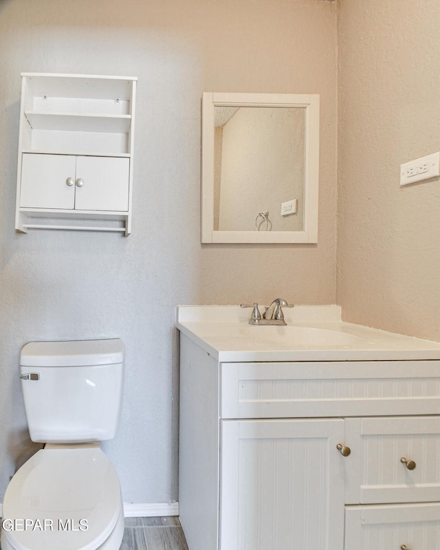 10712 Georgetown St, El Paso, TX 79924 - half bathroom with vanity and toilet