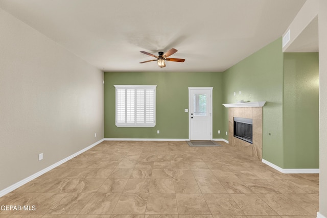 2937 Pino Triste Dr, El Paso, TX 79938 - unfurnished living room with ceiling fan and a tiled fireplace