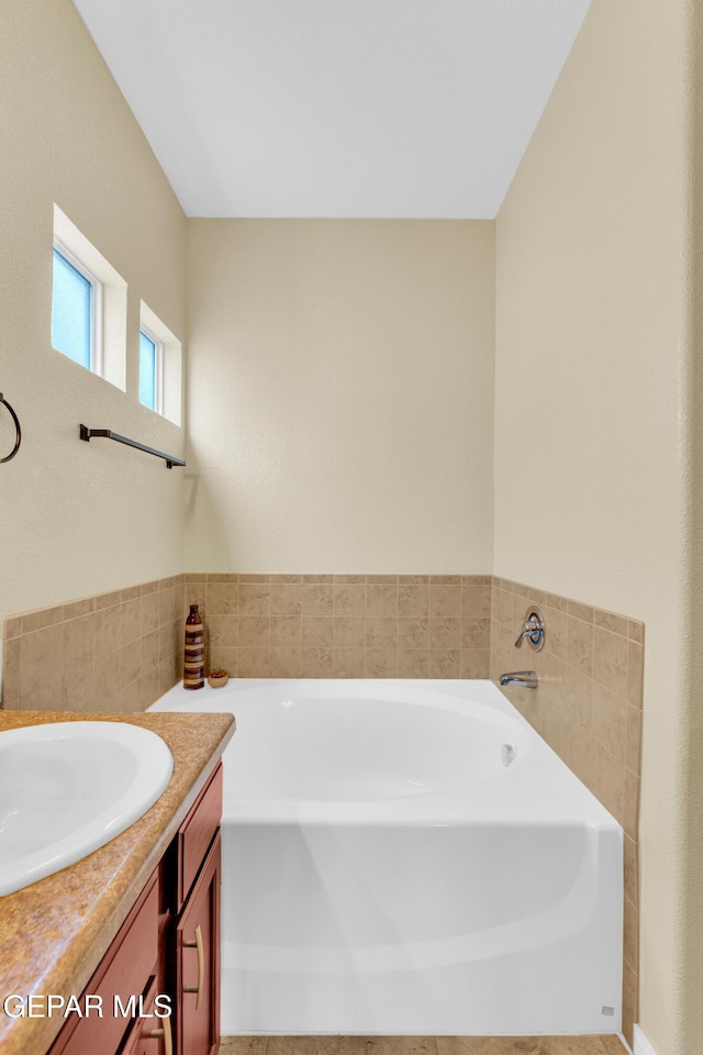 2937 Pino Triste Dr, El Paso, TX 79938 - full bathroom with vanity and a garden tub