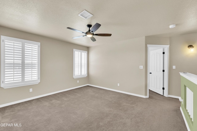 2937 Pino Triste Dr, El Paso, TX 79938 - unfurnished room with ceiling fan, carpet flooring, a textured ceiling, and a smoke detector