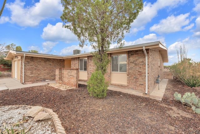 7308 Cerro Negro Dr, El Paso, TX 79912 - ranch-style house with brick siding and an attached garage