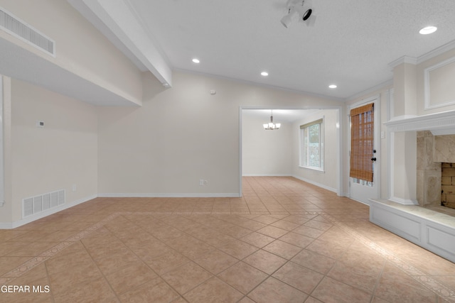 7308 Cerro Negro Dr, El Paso, TX 79912 - unfurnished living room with lofted ceiling, a fireplace with raised hearth, a chandelier, recessed lighting, and light tile patterned floors