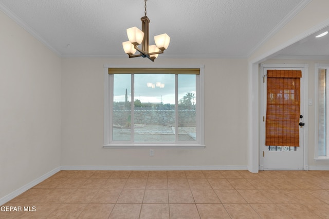 7308 Cerro Negro Dr, El Paso, TX 79912 - spare room with a chandelier, a textured ceiling, and ornamental molding