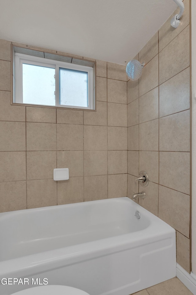 7308 Cerro Negro Dr, El Paso, TX 79912 - bathroom with shower / tub combination and tile patterned flooring