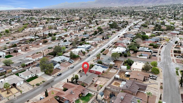 7308 Cerro Negro Dr, El Paso, TX 79912 - aerial view of property and surrounding area with a mountain backdrop and nearby suburban area