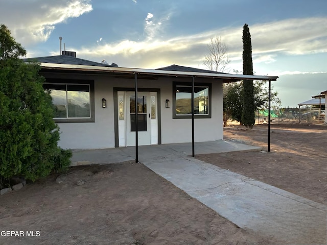 5789 Mountain Sun Dr, El Paso, TX 79938 - back of property with stucco siding