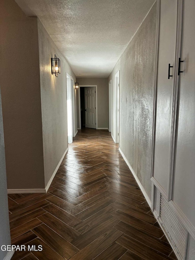5789 Mountain Sun Dr, El Paso, TX 79938 - hall featuring a textured wall and a textured ceiling