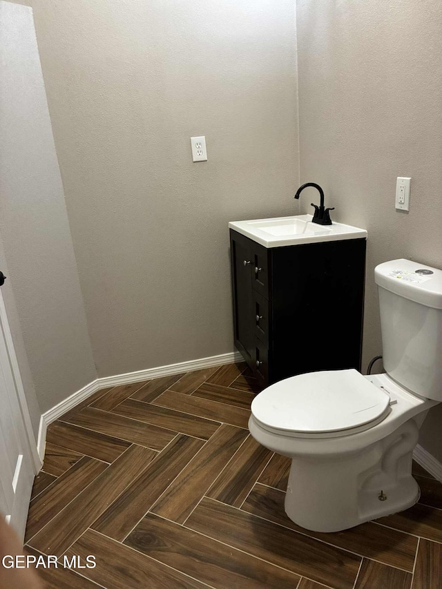 5789 Mountain Sun Dr, El Paso, TX 79938 - half bath with vanity and toilet
