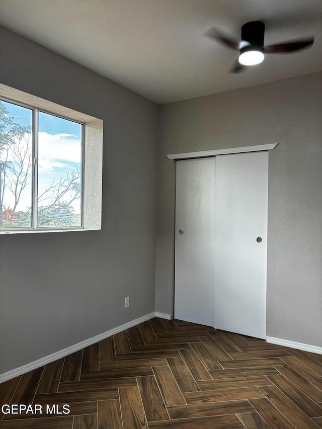 5789 Mountain Sun Dr, El Paso, TX 79938 - unfurnished bedroom featuring a closet and ceiling fan