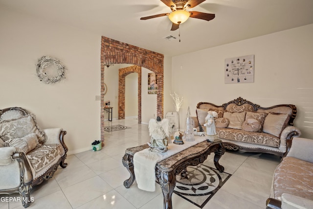 10728 Regina Dr, Socorro, TX 79927 - tiled living area featuring ceiling fan and arched walkways