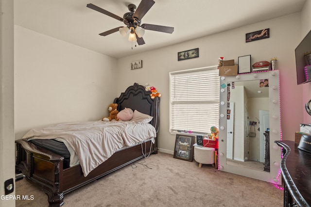 10728 Regina Dr, Socorro, TX 79927 - carpeted bedroom featuring a ceiling fan and baseboards