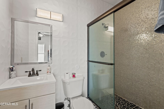 10728 Regina Dr, Socorro, TX 79927 - bathroom with vanity, a stall shower, and a ceiling fan
