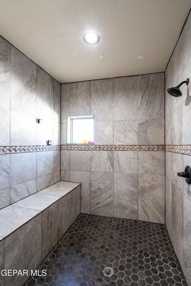 10728 Regina Dr, Socorro, TX 79927 - full bathroom featuring tiled shower, a textured ceiling, and recessed lighting