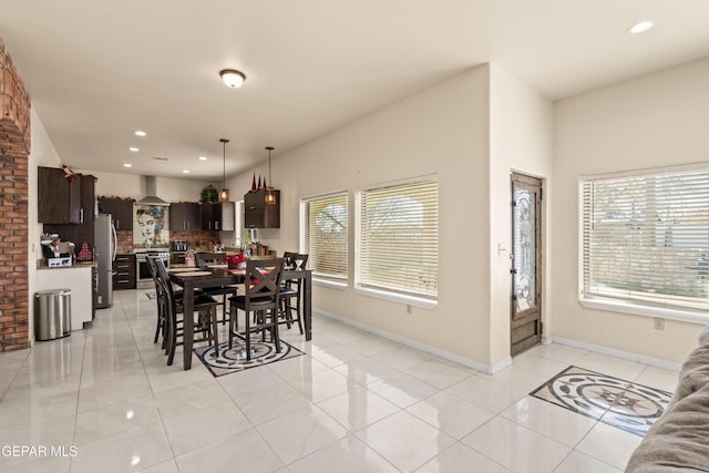 10728 Regina Dr, Socorro, TX 79927 - dining space with light tile patterned floors and recessed lighting