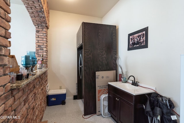 10728 Regina Dr, Socorro, TX 79927 - bathroom with a sink and speckled floor