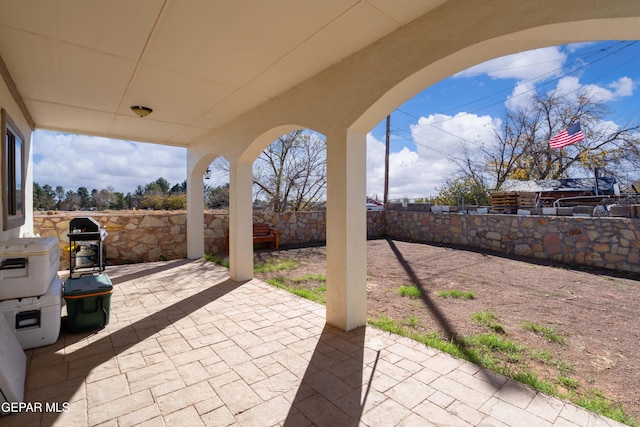 10728 Regina Dr, Socorro, TX 79927 - fenced backyard featuring a patio and a grill