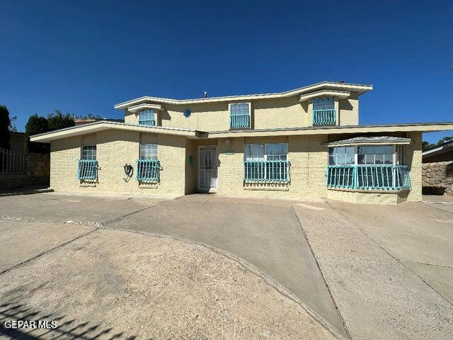 2129 Noviembre Dr, El Paso, TX 79935 - view of front of property featuring stucco siding