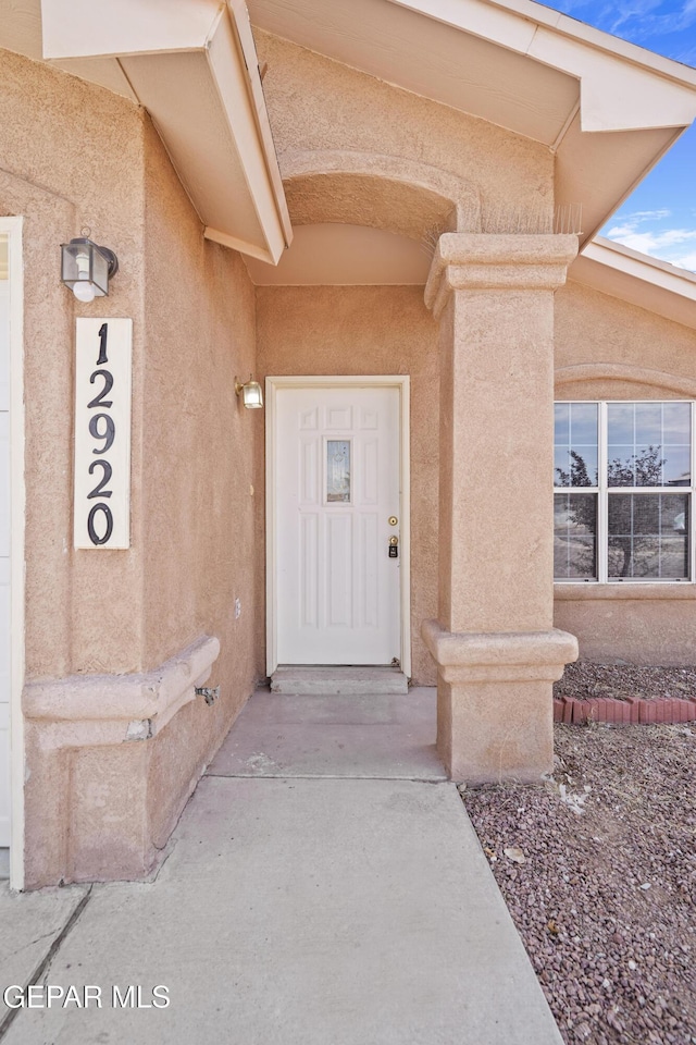 12920 Tierra Salas Dr, El Paso, TX 79938 - doorway to property featuring stucco siding