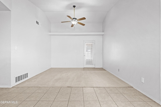 12920 Tierra Salas Dr, El Paso, TX 79938 - unfurnished room with light colored carpet, a ceiling fan, light tile patterned floors, and high vaulted ceiling