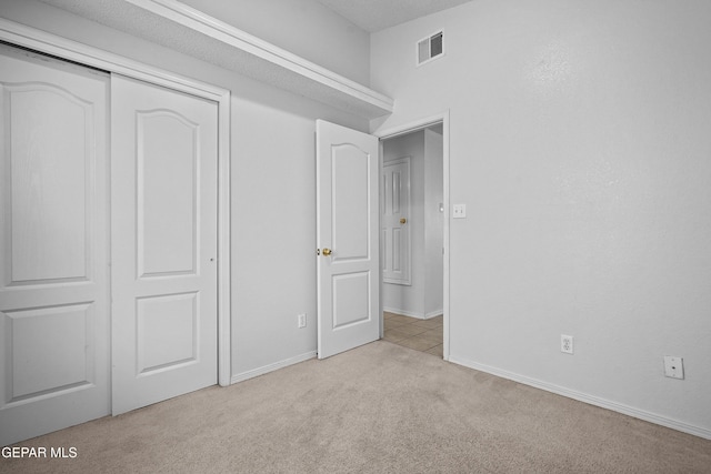 12920 Tierra Salas Dr, El Paso, TX 79938 - unfurnished bedroom with light carpet and a closet