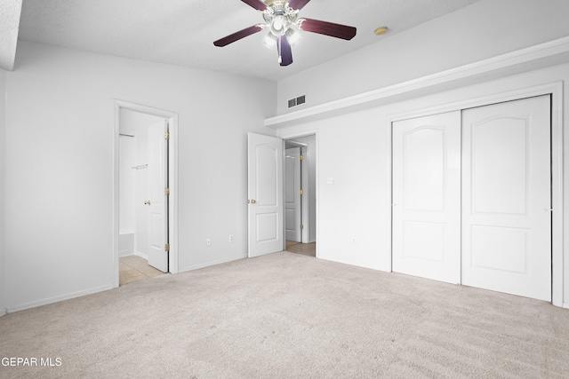 12920 Tierra Salas Dr, El Paso, TX 79938 - unfurnished bedroom with carpet, a closet, ensuite bath, and ceiling fan