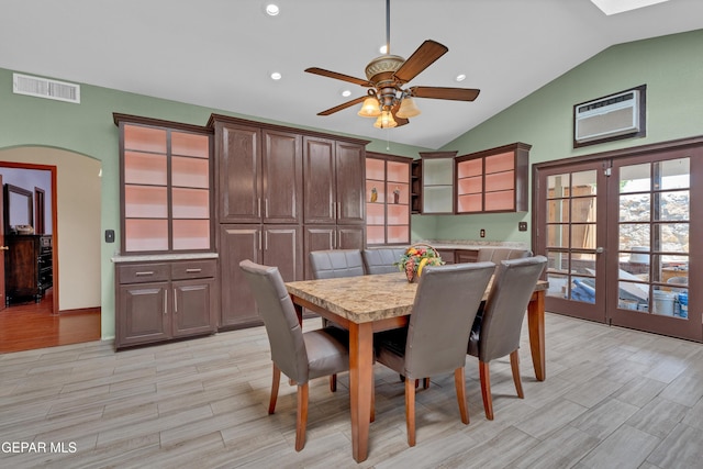 12249 Holy Springs Ct, El Paso, TX 79928 - dining room with vaulted ceiling, a ceiling fan, light wood-style flooring, a wall mounted AC, and recessed lighting