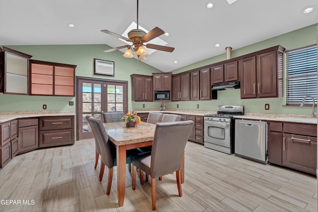 12249 Holy Springs Ct, El Paso, TX 79928 - kitchen with stainless steel appliances, ceiling fan, ventilation hood, healthy amount of natural light, and recessed lighting