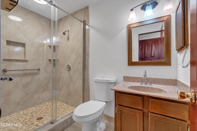 12249 Holy Springs Ct, El Paso, TX 79928 - bathroom featuring vanity and a shower stall