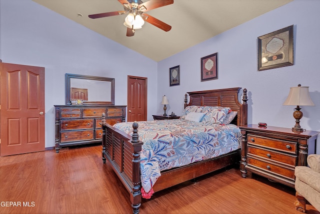 12249 Holy Springs Ct, El Paso, TX 79928 - bedroom featuring wood finished floors, a ceiling fan, and high vaulted ceiling